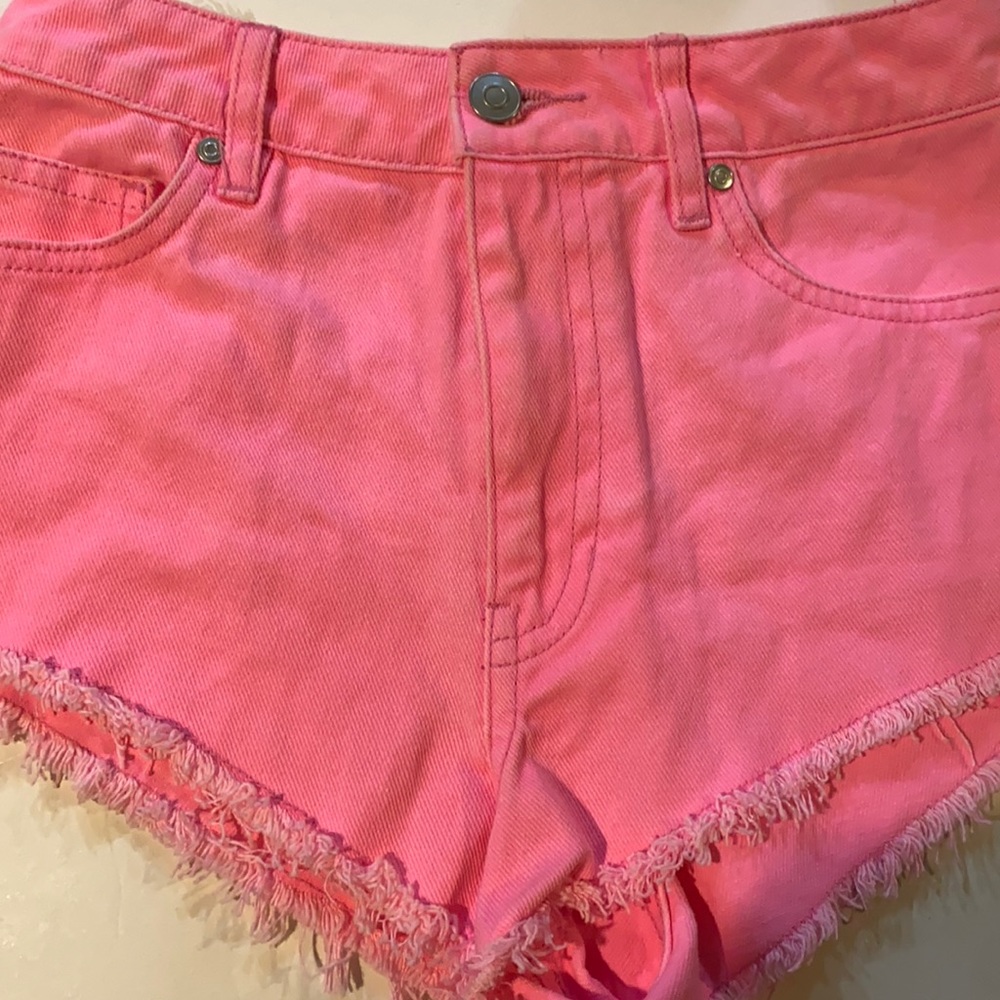 Neon pink jean shorts